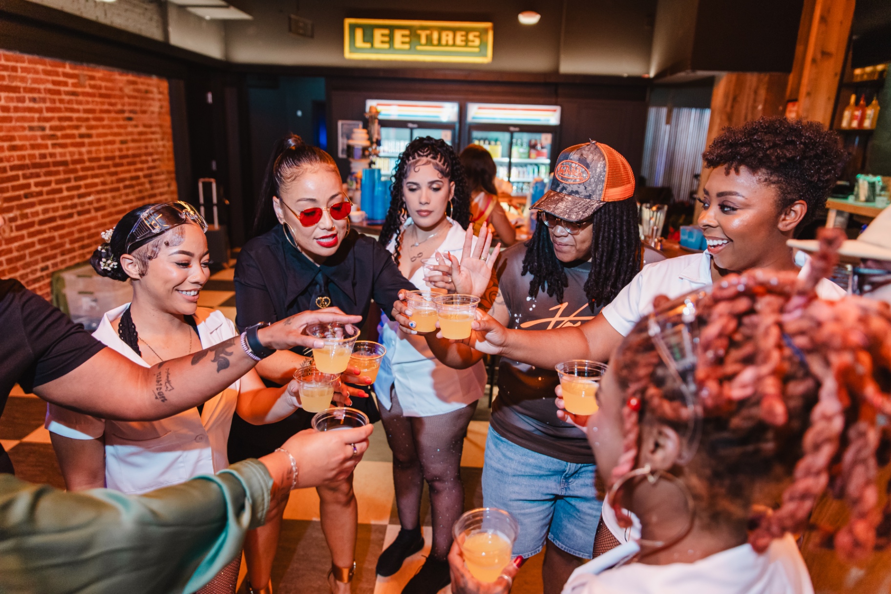 Guests toasting at The Cocktail Lab Live